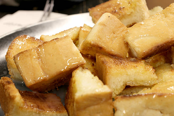 istock Bread toast with butter and condensed milk in 518253776