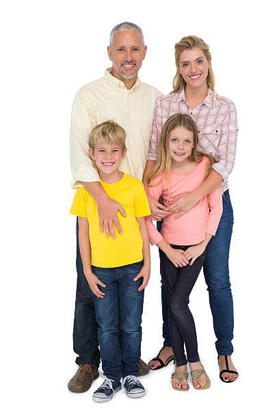 istock Happy family smiling at camera 518257595