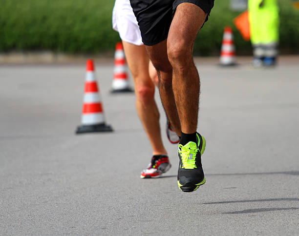 istock Marathoner runs very fast for the paved road 518257863