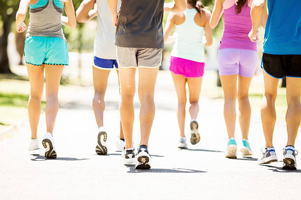 istock Men And Women Running Marathon 518258285