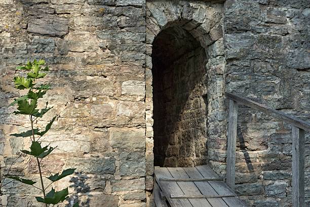 hole in a stone wall for an entrance to a fortress