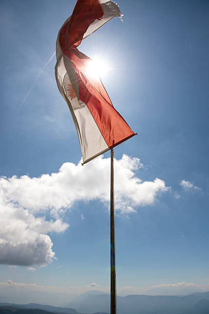 istock Flag of Tirol with blue sky 518258893