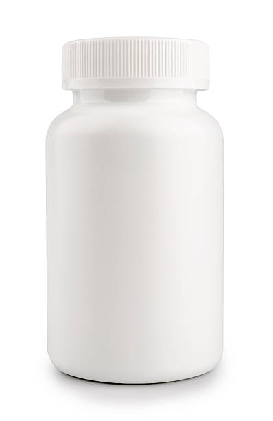 медицина белый пузырёк с таблетками изолированные на белом фоне - pill bottle bottle medicine white стоковые фото и изображения