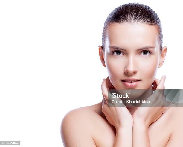 Beautiful Face Of Young Adult Woman With Clean Fresh Skin Stock Photo - Download Image Now