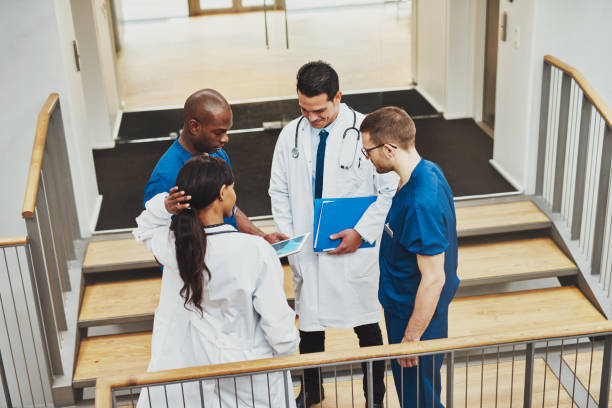 istock Confident team of doctors talking 518272444