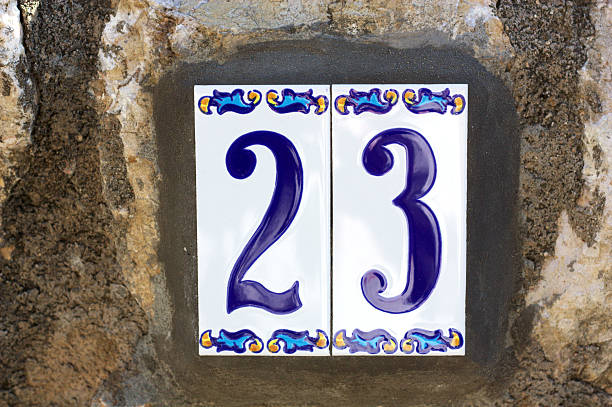 istock House number 23, made in ceramic and hand painted 518272662