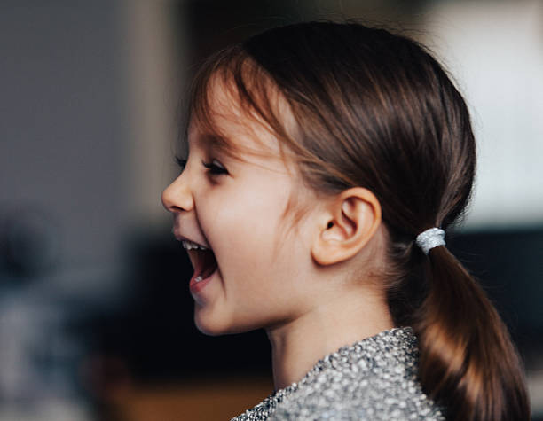 istock children girl enjoying screaming expression 518274678