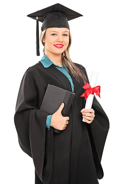 istock Female graduate student holding a diploma 518275577