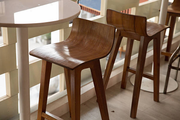 istock wooden stool with round table at the balcony 518276056