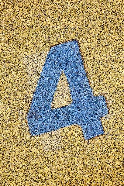 istock Number Four sign on sand fome 518276327