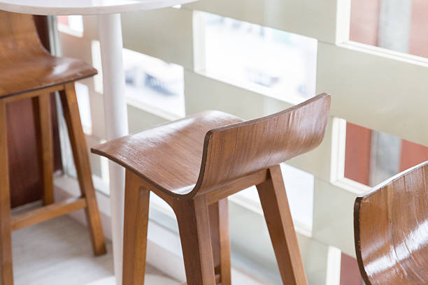 istock wooden stool with round table at the balcony 518277318