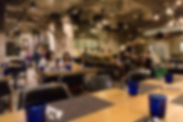 istock cafe coffee shop restaurant interior, blur and defocus 518277422