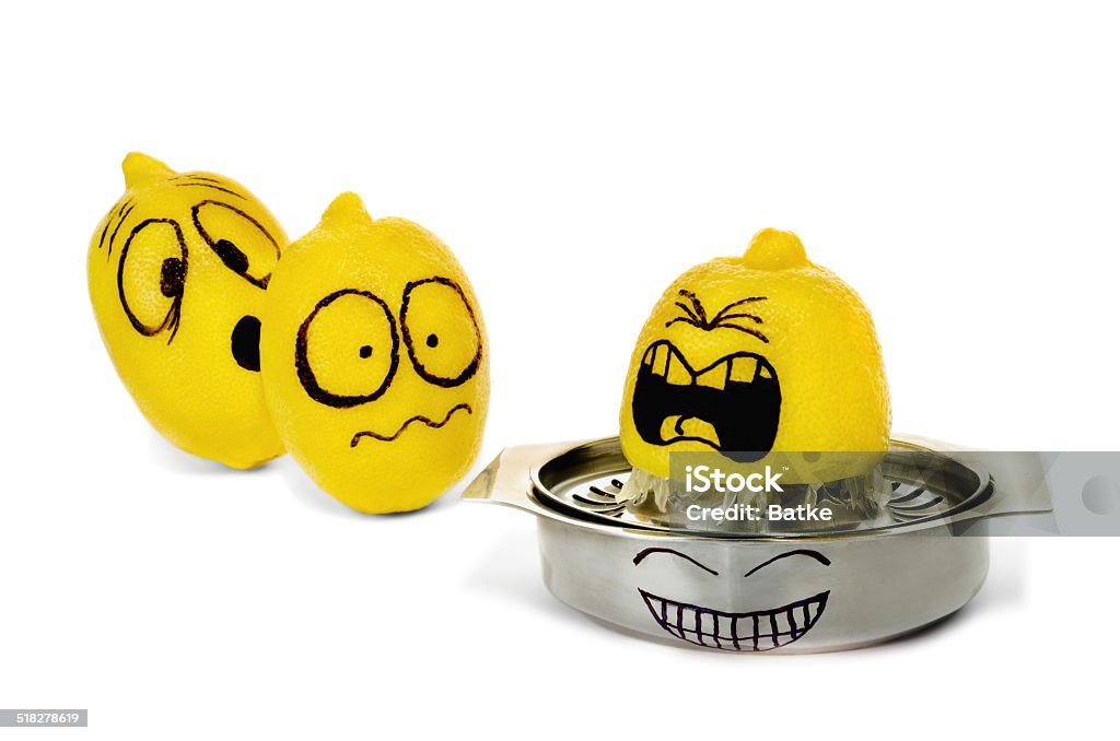 Three lemons with funny painted emotions squeezing on strainer. A shot of Funny lemons with painted emotions squeezing on strainer, isolated on white. Lemon - Fruit Stock Photo