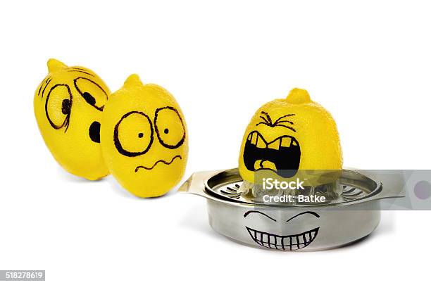 Three Lemons With Funny Painted Emotions Squeezing On Strainer Stock Photo - Download Image Now