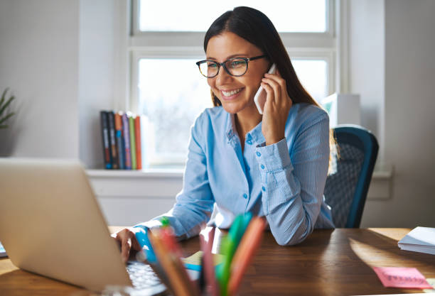 istock Happy entrepreneur working at desk 518280614