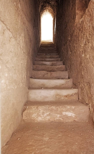 istock narrow passage with  stone staircase 518280839