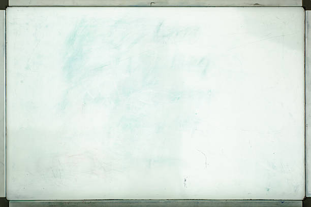 istock Old whiteboard for office with traces of stains and spots 518281200