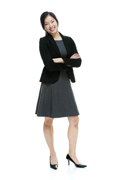 istock Smiling businesswoman standing 518282348