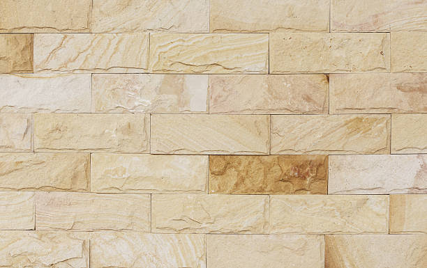 istock sand stone wall Background of decorate 518291499