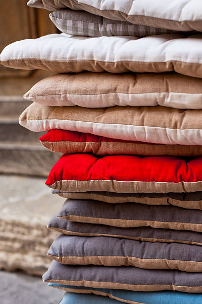 istock Linen chair pillows pile 518296535