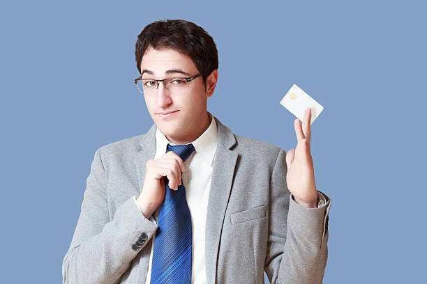 istock businessman with pay card 518297293