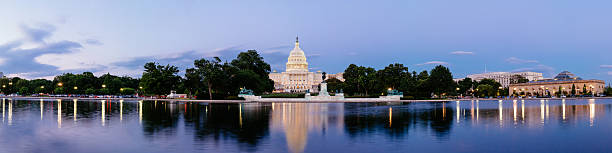 The United Statues Capitol Panorama of the United Statues Capitol, seen from the the Capitol Reflecting Pool, Washington DC, USA. united states congress photos stock pictures, royalty-free photos & images