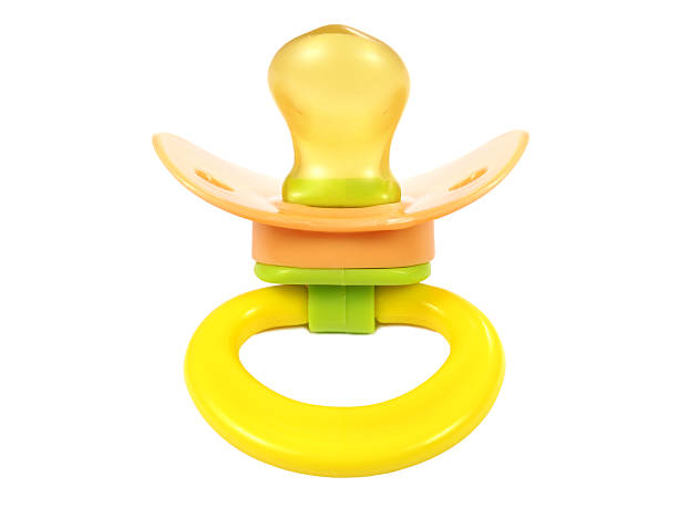 istock Colorful baby's dummy isolated on white 518303846