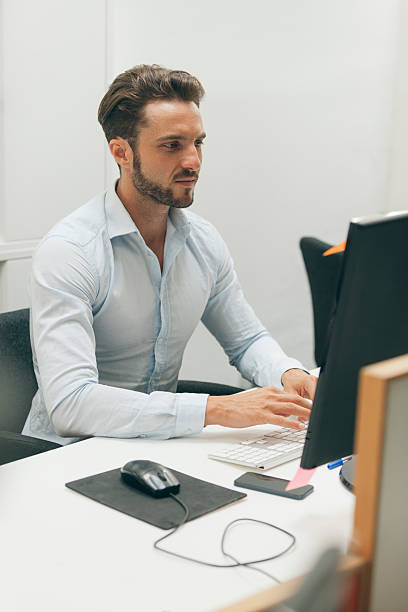 istock Businessman Working In His Office 518304256