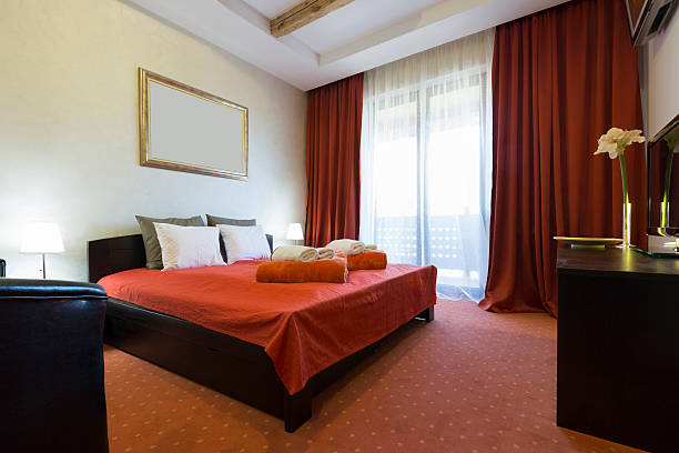 istock Elegant hotel bedroom interior 518308124