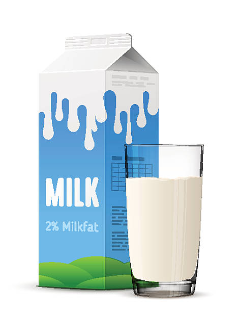 istock Glass of milk with gable top package close up 518308428
