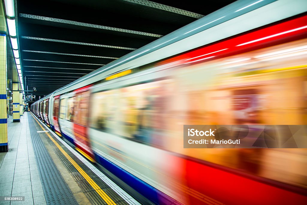 London's Underground A train stopped in one of the stations of London's tube. London Docklands Stock Photo