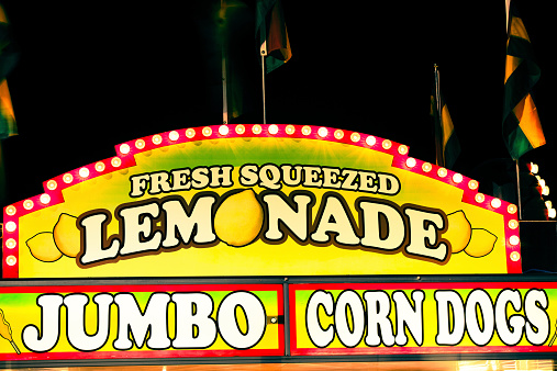 Lemonade & Corndog Sign At Amusement Park