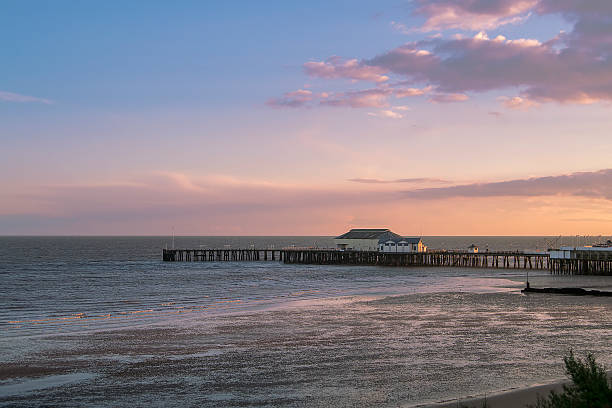 Sunset on the seaside Sunset on the seaside in Clacton-on-Sea, England. clacton on sea stock pictures, royalty-free photos & images