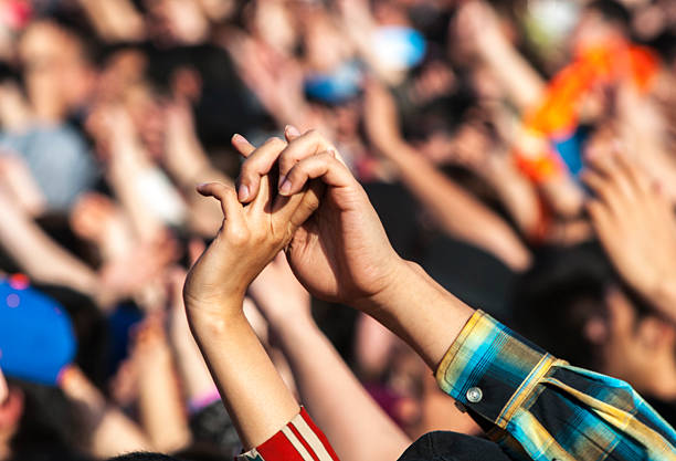istock hand in hand in festival 518321688