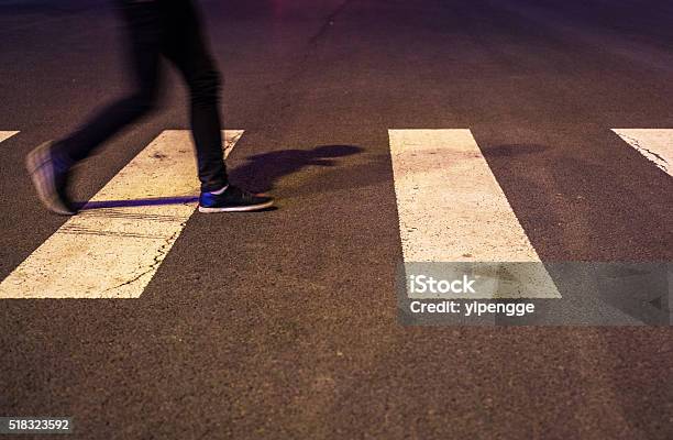 Man In Jeans Walking Across A Zebra Crossing Stock Photo - Download Image  Now - Crosswalk, Zebra Crossing, Crossing - iStock