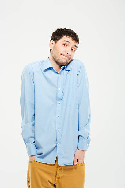 istock Portrait of a man shrugging shoulders 518324062
