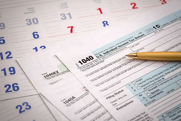 istock us 1040 tax form with calendar 518324710