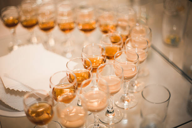 istock Different alcohol drinks in goblets and wine glasses on wedding 518327180
