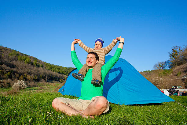 istock Father is playing with his son on the meadow 518328528