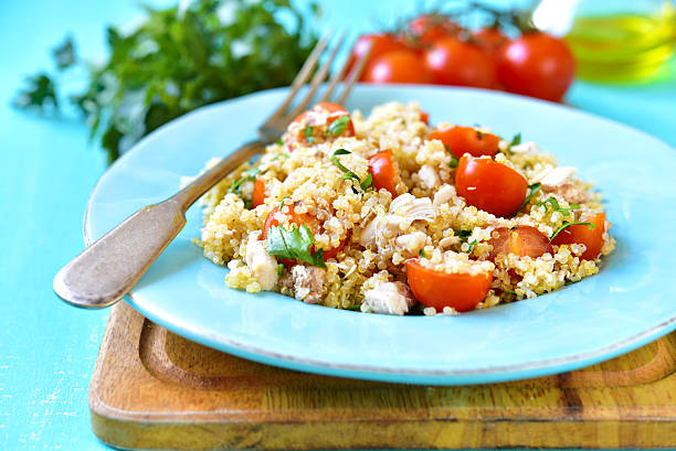 istock Quinoa salad with cherry tomatoes and chicken. 518332916