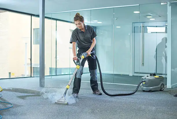 Photo of steam cleaning the office carpet