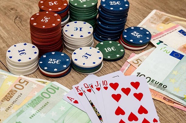 istock play card with euro bills, chips 518333476