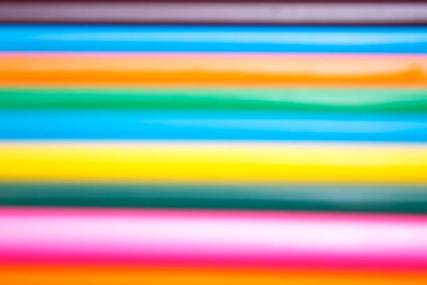 istock blurred background of colored pencils 518338354