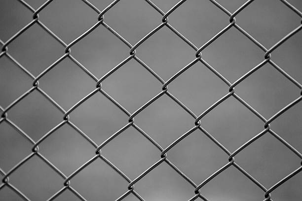 wire fence wire fence shooting guard stock pictures, royalty-free photos & images