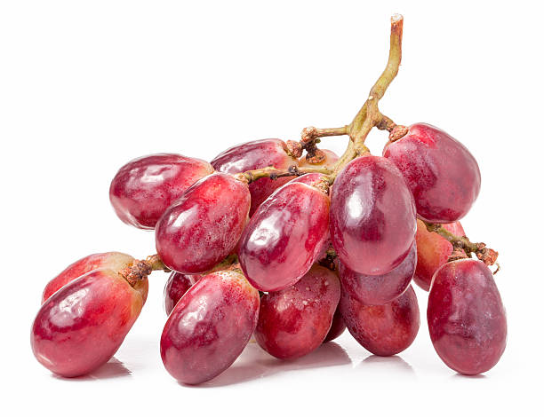 istock Ripe red grapes isolated on white background 518344758