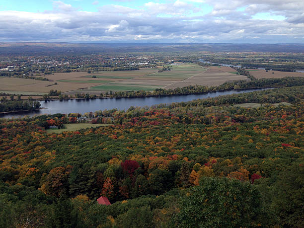 The view from atop Mount Holyoke in Western Massachusetts includes the Connecticut River and autumn leaves beginning to show colors.