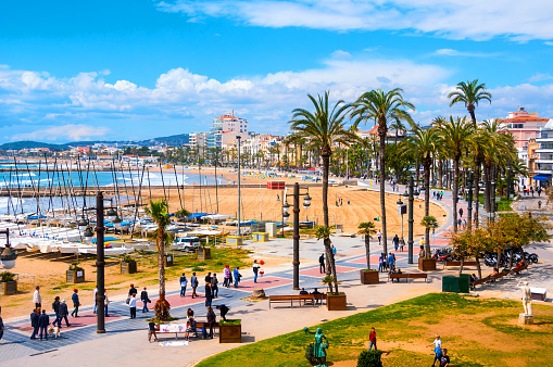 Aerial view of Sitges, Spain beach and promenade area of the popular touristic town in Costa Dorada. The coastal city in Catalonia is famous for its Film Festival and Carnival