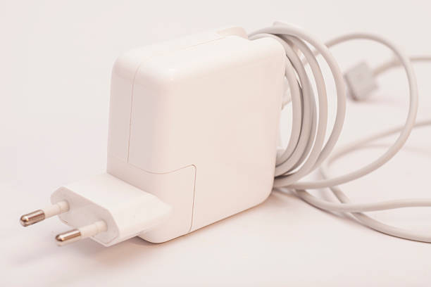 istock Electrical adapter to USB port on a white background 518350004