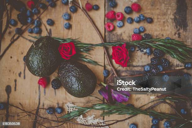 Berries Plums And Avocados On Barnwood Stock Photo - Download Image Now - Avocado, Backgrounds, Blackberry - Fruit