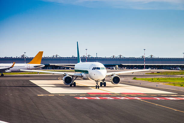 Airplane on taxi before departure in the airport.